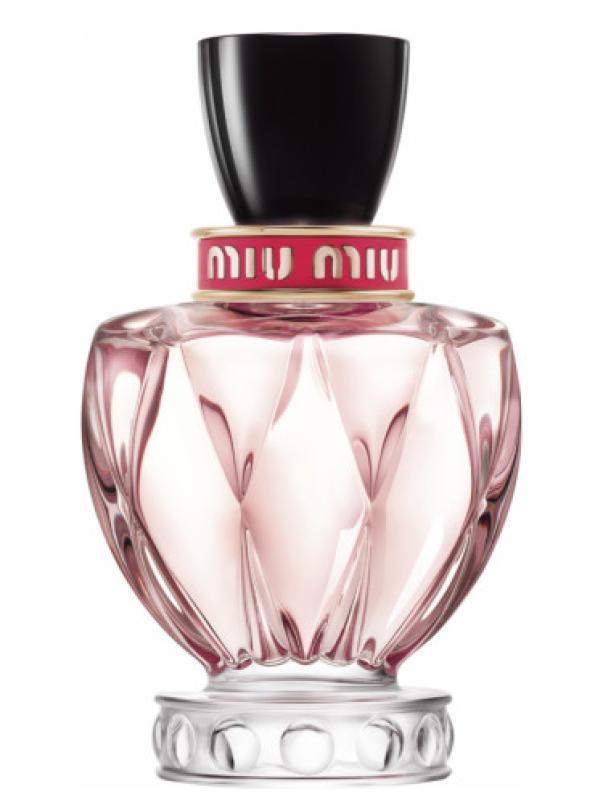 miu miu e.d.p.miu miu twist 50ml - foto 1 Flacone Miu Miu Twist 50ml, rosa trasparente con tappo nero e fascia logo, su sfondo bianco