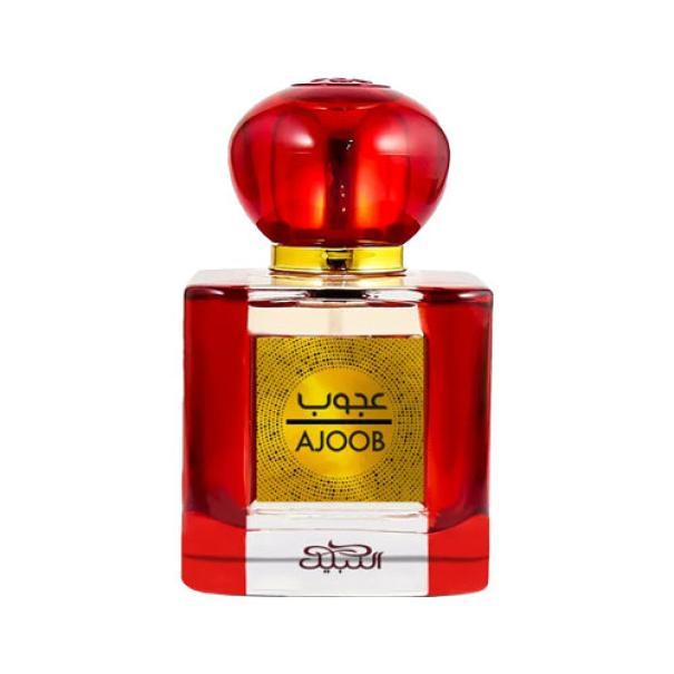 nabeel e.d.p.nabeel ajoob 100ml - foto 1 Bottiglia profumo Nabeel E.D.P. Ajoob 100ml con tappo rosso sfaccettato, flacone trasparente e liquido giallo-dorato